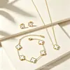 Conjunto de tres piezas más vendido transfronterizo: Collar de oro de 18k, que no se decolora, con trébol de cuatro hojas y diez flores, presentando un estilo de lujo ligero y un sofisticado diseño de collar francés