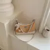 Bolsa Retrô da Moda para o Dia a Dia de Mulheres 2026 Novo Modelo Elegante Versátil Bolsa Transversal com Toque de Luxo Bolsa de Ombro Nicho Estilo Bolinho