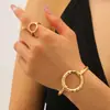 Conjunto de dos piezas de pulsera y anillo con estampado de leopardo, apertura geométrica transfronteriza europea y americana, pulsera ajustable con personalidad exagerada para mujer