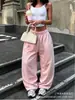 Pantalones de calle casuales para mujer de estilo europeo y americano de Amazon, con cordones, versátiles, holgados, de moda, de pierna ancha, en stock, al por mayor
