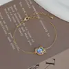 Chapado electrolítico de oro real circón microincrustado joyería elegante diseño de nicho femenino pulsera de lazo pulsera simple versátil para todo
