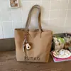 Bolso de Hombro Tote Retro de Nicho Nuevo para Mujer Primavera 2026, Adecuado para Viajes al Trabajo y Clases, Bolso de Mano de Lona de Gran Capacidad