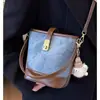 Bolsas para Mujer 2026 Primavera Nuevo Estilo Bolso de Mano Súper Popular Textura de Alta Calidad Bolso Cubo de Hombro Único Cruzado