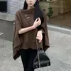 Suéter tipo capa de punto versátil de estilo casual transfronterizo europeo y americano para mujer, chaqueta cárdigan holgada de hombros caídos para mujer