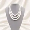 Collar de perlas de vidrio estilo cheongsam multicapa, nuevo estilo retro, cadena de clavícula, cadena de lana de doble capa, cadena de cuello de vidrio de tres capas