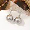Pendientes de perla de trébol de cuatro hojas, aguja de plata de ley 925, pendientes de flor de cuatro pétalos, lujo ligero, sensación de alta gama, temperamento exquisito, pendientes de moda