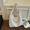 Bolsa transversal de novo estilo 2026, transfronteiriça, fresca e simples, bolsa de ombro única de grande capacidade com alça de bolinhas, bolsa tote casual estilo coreano