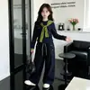 Conjunto de otoño para niña 2026 nuevo elegante top tipo chal de alta gama para niños y pantalones de trabajo de primavera/otoño conjunto de dos piezas