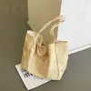 Bolsa Tote de Comércio Exterior Estilo Coreano com Bolinhas Feminina 2026 Nova Grande Capacidade Casual Bolsa de Mão Estilo Preguiçoso para o Trabalho Bolsa de Ombro Única