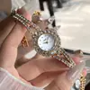 O relógio feminino redondo de quartzo mais vendido da Gedi com pulseira cravejada de diamantes, à prova d'água, estiloso e versátil, relógio de pulso feminino de nicho para o dia a dia.