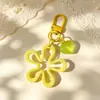 Chaveiro de flor ondulada grande colorido acrílico ins flor oca corrente de telefone acessório de bolsa pingente de coração diy