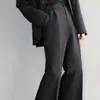Pantalones de vestir casuales negros holgados y fluidos con forro de polar para otoño e invierno, modernos y duraderos, ligeramente acampanados, de longitud extendida