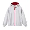 Moletom com zíper bicolor para homens, marca moderna nova primavera/outono 2026, jaqueta com capuz versátil esportiva casual solta