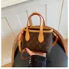 Bolso Cubo Transfronterizo para Mujer 2026 Nuevo Modelo Bolso de Mano de Nicho de Alta Gama Bolso Tote Versátil Bolso de Hombro Cruzado