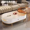 Mesa de centro em laje de rocha, sala de estar, uso doméstico, luxo leve, estilo moderno, minimalista, novo design, formato oval, popular entre influenciadores online, adequada para apartamentos pequenos