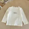 Chaqueta cárdigan para bebé niña 2026 Primavera Nuevo estilo Clase a Bebé Camisa de doble botonadura Top con cuello de muñeca para niña