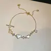 Pulseira Coração de Madrepérola Banhada a Ouro Real 14K Zircônia Toque de Luxo Leve High-End Anel de Mão Design de Moda de Nicho Sentido Joia de Mão
