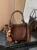 Bolso de hombro casual de nicho simple y elegante transfronterizo, nuevo bolso de mano popular estilo coreano otoño 2026, bolso de moda