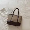 Bolsa feminina grande de capacidade, estilo retrô simples, novo modelo para o início do outono de 2026, bolsa de ombro estilosa e texturizada, bolsa tote de trabalho moderna e chique