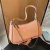 Bolso pequeño transfronterizo estilo retro para mujer, nuevo bolso casual de color liso para otoño 2026, moderno bolso de hombro y cruzado