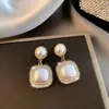 Brincos de Pérola Imitação Barroca de Alta Qualidade, Brincos de Luxo Niche com Laço e Diamantes Cintilantes, Novos Brincos Populares Estilo 2026