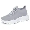 Zapatos de mujer transfronterizos para primavera y verano, con parte superior de malla flyknit, suela gruesa, diseño transpirable con patrón de rombos, ajuste tipo calcetín, color liso, versátiles y de estilo casual