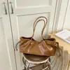 Bolso de hombro retro minimalista, nueva colección otoño 2026, bolso tote casual, elegante y visualmente atractivo, diseño plisado, bolso de axila para mujer
