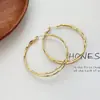 Brincos de Argola Dupla Entrelaçada Círculo Estilo Minimalista de Nicho Europeu e Americano, Argolas Lisas Exageradas da Moda e de Alta Qualidade para Mulheres
