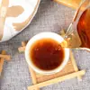 Pastel de té Pu'er cocido de Yunnan té cocido Pu'er añejo pastel gong tinggong 357G Pastel de té Siete Semillas Yema Dorada