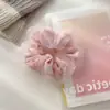 Nueva versión coreana del anillo para el cabello de perlas, sencillo, moderno, de tela, anillo para el cabello de intestino grueso, cuerda para el cabello con bola de cola de caballo, fabricantes, venta al por mayor