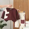 Traje de Moda para Niños Primavera 2025 Estilo Nuevo Pequeño y Mediano Bebé Primavera y Otoño Bloques de Letras Manga Larga Conjunto de Dos Piezas Estilo Moderno