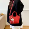 Bolsa de mão de nicho estilo coreano para mulheres, novo modelo de início de outono de 2026, bolsa de ombro e transversal casual estilosa e atraente