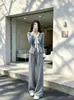 Traje de dos piezas para mujer con cuello en V francés, corbata de lazo y borde con volantes, nueva colección de otoño 2026, pantalones de pierna ancha de cintura alta adelgazantes, moderno