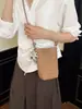 Bolso de teléfono tejido de diseño de nicho versátil 2026 transfronterizo para el trabajo, bolso de hombro/cruzado moderno y simple