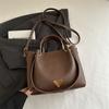 Bolsa Feminina Nova de Primavera Moda Bolsa Balde Portátil Texturizada Retrô de Alto Valor Bolsa Transversal de Ombro Único Bolsa Simples de Axila