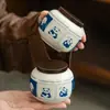 Marco de fotos de fábrica Lata de té de panda Tarro de té de cerámica Tarro de almacenamiento de granos sellado pequeño portátil para el hogar A prueba de luz y humedad