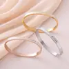 Moda Transfronteriza nuevo brazalete de diamante de arcilla para mujer 6 mm fila doble separada de taladro brazalete ovalado de acero inoxidable venta al por mayor