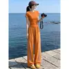 Conjunto Casual de Roupa Esportiva para Mulheres, Estilo Fino de Verão, Novo Estilo 2026, Fashion e Chique, Conjunto de Duas Peças com Blusa de Manga Curta e Calça Pantalona para Pessoas Baixas