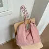 Bolsa de lona casual de gran capacidad para mujer, nuevo modelo 2026, bolso de hombro con cierre de cordón, bolso de mano tote moderno y versátil