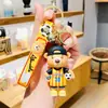 Chaveiro Criativo Urso de Futebol Desenho Animado Carro Penduricalho de Bolsa Casal Criativo Masculino Pequeno Presente Atacado
