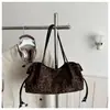 Moda Japonesa Coreana Retro Simple Gamuza 2026 Nuevo Otoño para Mujer Sensación de Alta Gama Bolso Cubo de Hombro Único de Mano Cruzado