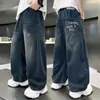 Calça Jeans Larga de Outono para Meninos 2026 Crianças Médias e Grandes Tendência Lavada Estampa de Letras Calças Longas Calças Casuais Outono