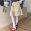 Saia Curta com Bolsos Preta Estilo Hong Kong para Mulheres, Saia Evasê Vintage de Cintura Alta Emagrecedora, Saia Volumosa Petite com Cintura Elástica