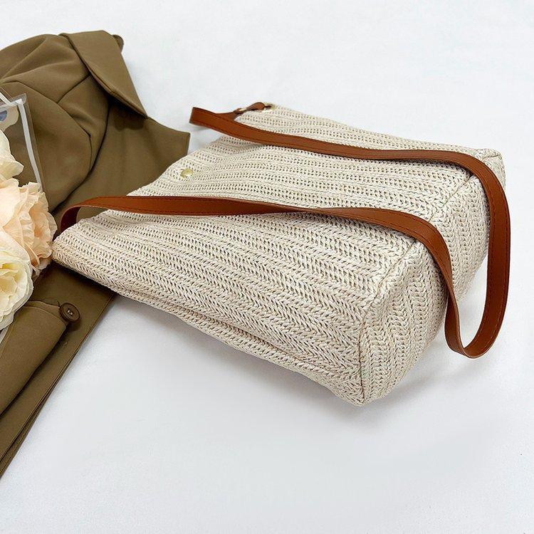 编织包女包新款潮2024夏草编简约百搭小清新水桶包个性单肩斜