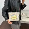 Bolso de hombro infantil estilo caricatura japonés y coreano, bolso de mano de lunares, bolsa de asas de gran capacidad, bolso de mano transfronterizo 2026