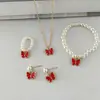 Novo Conjunto Popular de Joias Infantis Transfronteiriço Pingente de Borboleta com Gotas de Óleo Pulseira de Pérolas Brincos Colar Joias Mulheres