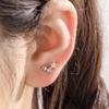 Pendientes Henson de titanio y acero con doble cabeza de tornillo, con forma de hueso de oreja, con forma de estrella, perforados para niñas de alta gama.