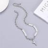 Collar de mujer de acero de titanio de alta calidad de nicho europeo y americano, cadena de clavícula cruzada con grietas de hielo y piedra de metal irregular, joyería para hombres