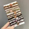 Corda de Cabelo Feminina Celebridade da Internet Alta Elasticidade Durável Corda de Cabelo Diária Fofa Elástico de Cabelo Anel de Cabelo com Capa de Couro Simples Acessório de Cabeça