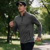 Sudadera con capucha deportiva para hombre, color liso, cuello alto, manga larga, cremallera a media altura, primavera, otoño, corte ajustado, casual, talla EU de Amazon